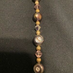 7” bracelet, Antiqued gold, bronze, black and pink beads also rhinestones